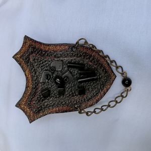 Cute leather shield brooch kitsch